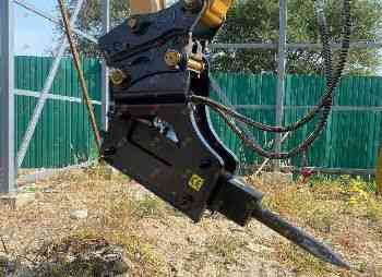 Гидромолот на экскаватор-погрузчик