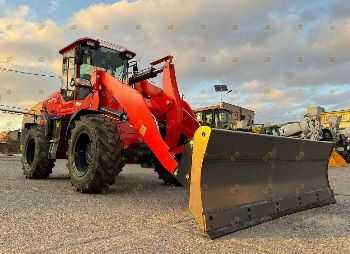 Поворотный отвал